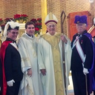 On December 30, members of St. Matthew Norwalk Knights of Columbus Council 14360, representing Assembly #100, Bishop Fenwick in Norwalk, attended Mass at Our Lady of Solace church in the Coney Island section of Brooklyn. The assembly members dressed in full color guard regalia and were led by Color Corps Commander Bill Berger, Faithful Navigator of Assembly #100. The Mass was celebrated by the Bishop of Brooklyn, Bishop Nicholas DeMarzio. Our Lady of Solace Parish was hit hard by Hurricane Sandy, and through St. Matthew’ Parish in Norwalk, the Knights have helped out with goods, Christmas gifts and other supplies to get parishioners through the holidays. In the picture with Bishop DeMarzio are Sir Knights Anthony Armentano, Scott Mazzo, Mike Colaluca, Bill Berger, George Ribellino and Scott Criscuolo.